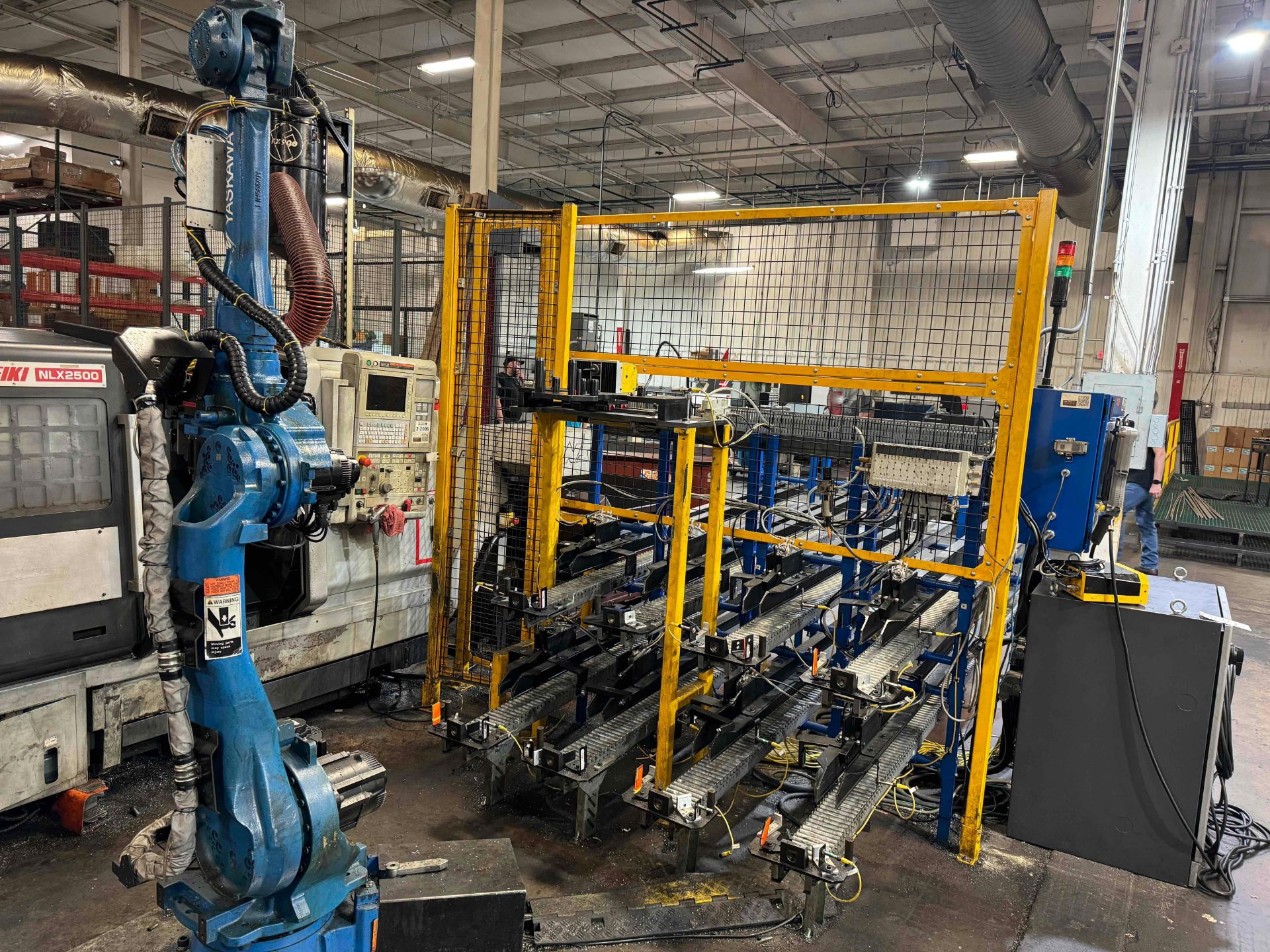 YASKAWA MOTOMAN, MH-50 II, ROBOTIC PARTS LOADING SYSTEM WITH DX200 CONTROL